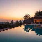 lucid-origin_elegant_social_gathering_villa_sunset_soft_light-0