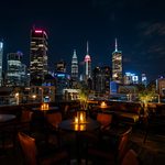 lucid-origin_exclusive_rooftop_lounge_night_ambient_lighting-7