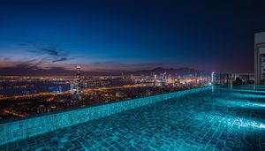 lucid-origin_infinity_pool_overlooking_city_lights_night-3