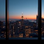 lucid-origin_handshake_in_penthouse_office_city_view_dusk_16_9-3